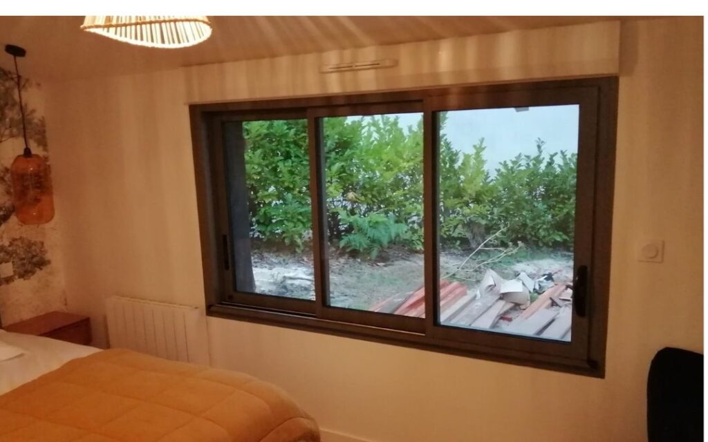 Fenêtre coulissante en alu double vitrage